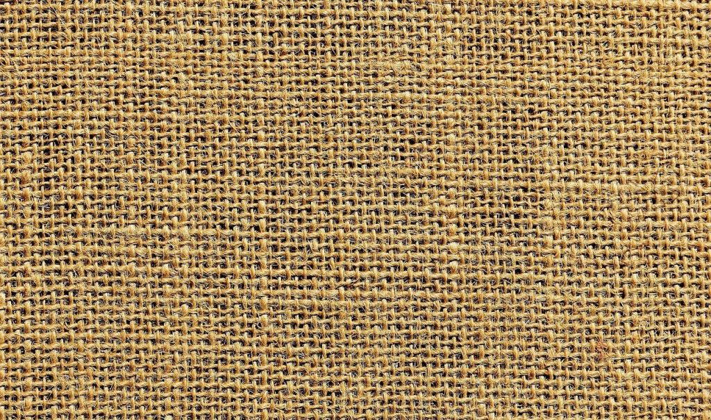 De onmisbare rol van textiel in confectie Textiel in confectie met afwerkingsdetails zoals biaisband en elastiek voor hoogwaardige kleding